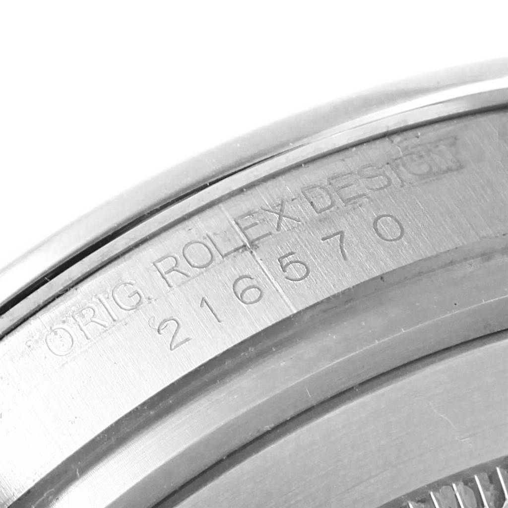 This image shows the serial number and part of the case back of a Rolex Explorer 216570 Men
s Stainless Steel Black Dial 216570 Men
s Stainless Steel Black Dial model.