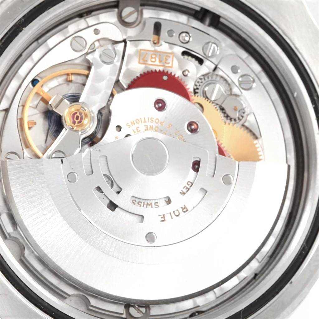 The image shows the intricate rear view of the Rolex Explorer 216570 Men's Stainless Steel White Dial 216570 Men's Stainless Steel White Dial model, highlighting its internal mechanical movement.