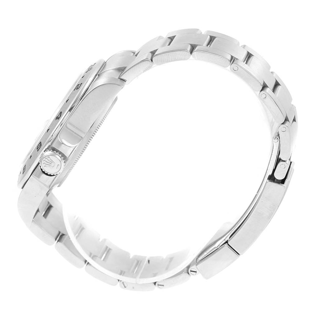 Side view of a Rolex Explorer 216570 Men's Stainless Steel White Dial 216570 Men's Stainless Steel White Dial, showcasing the crown, case, and bracelet links.