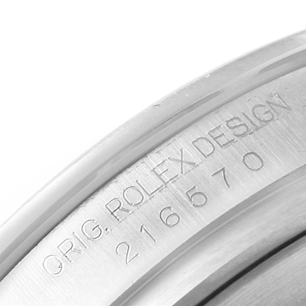 This image shows a close-up of the case side engraving on a Rolex Explorer 216570 Men's Stainless Steel Black Dial 216570 Men's Stainless Steel Black Dial watch.
