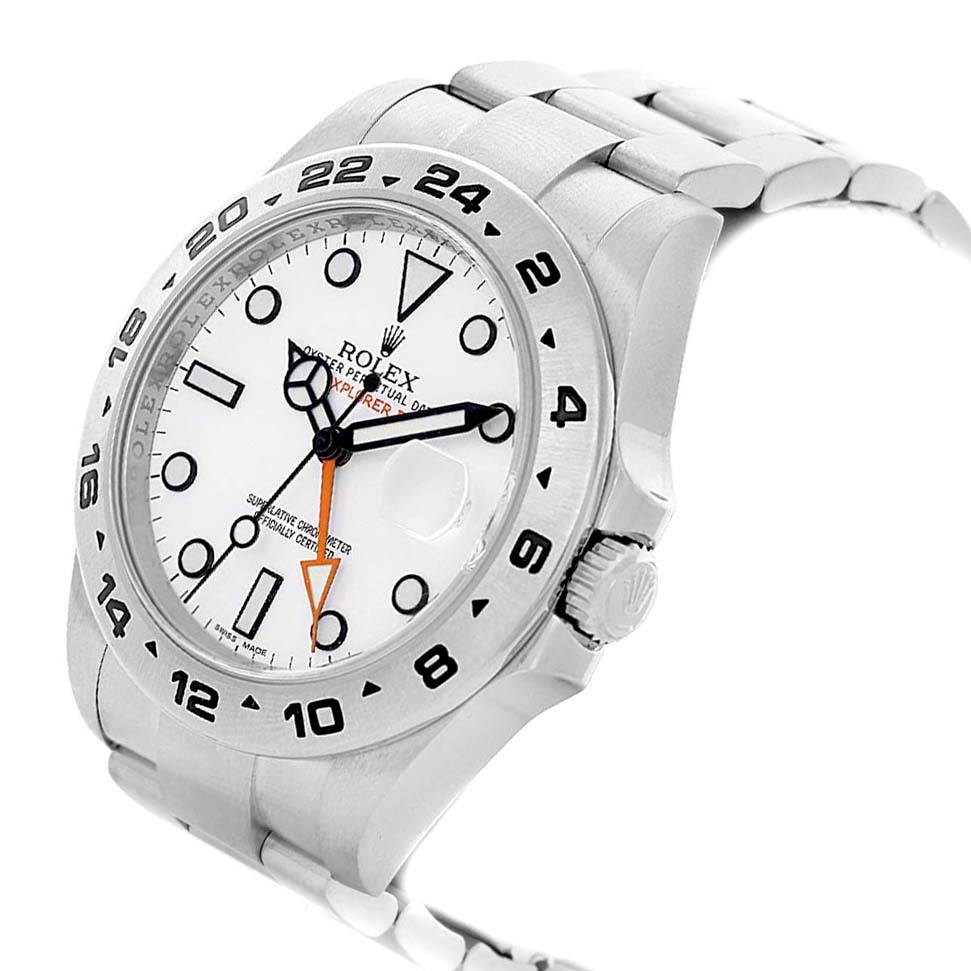 The Rolex Explorer 216570 Men's Stainless Steel White Dial 216570 Men's Stainless Steel White Dial watch is shown at a three-quarter angle, highlighting the face, bezel, crown, and part of the bracelet.