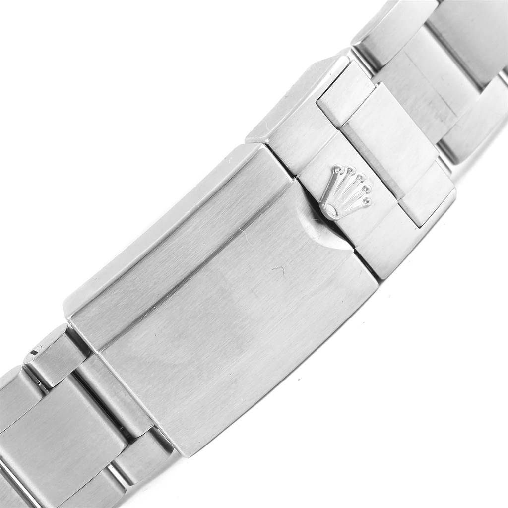 The image shows the clasp and bracelet of a Rolex Explorer 214270 Men's Stainless Steel Black Dial 214270 Men's Stainless Steel Black Dial watch, taken from a close-up and top-down angle.