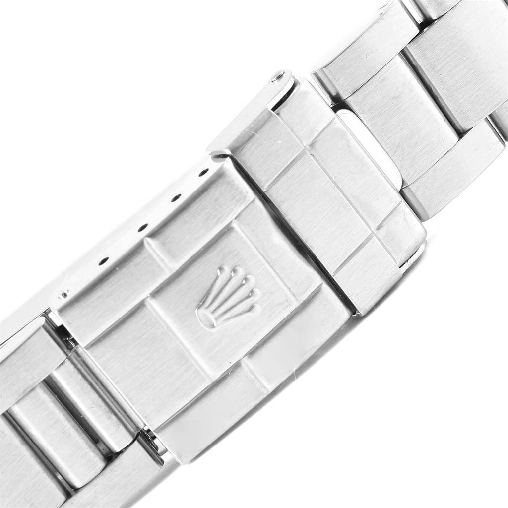 The image shows a close-up angle of the bracelet and clasp of a Rolex Explorer 16570 Men's Stainless Steel White Dial 16570 Men's Stainless Steel White Dial watch.
