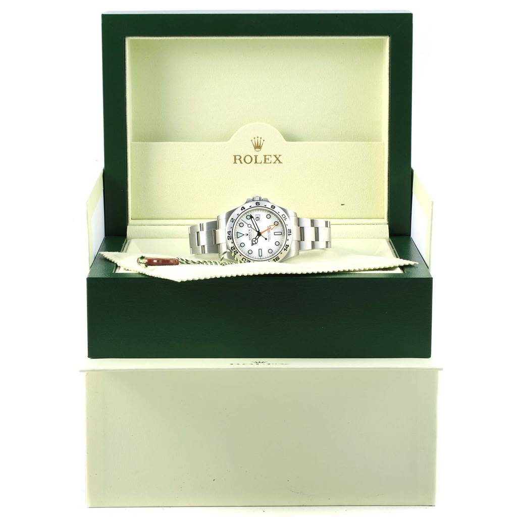 The image shows a Rolex Explorer 216570 Men's Stainless Steel White Dial 216570 Men's Stainless Steel White Dial model watch from a straight-on angle, in its open green Rolex box.