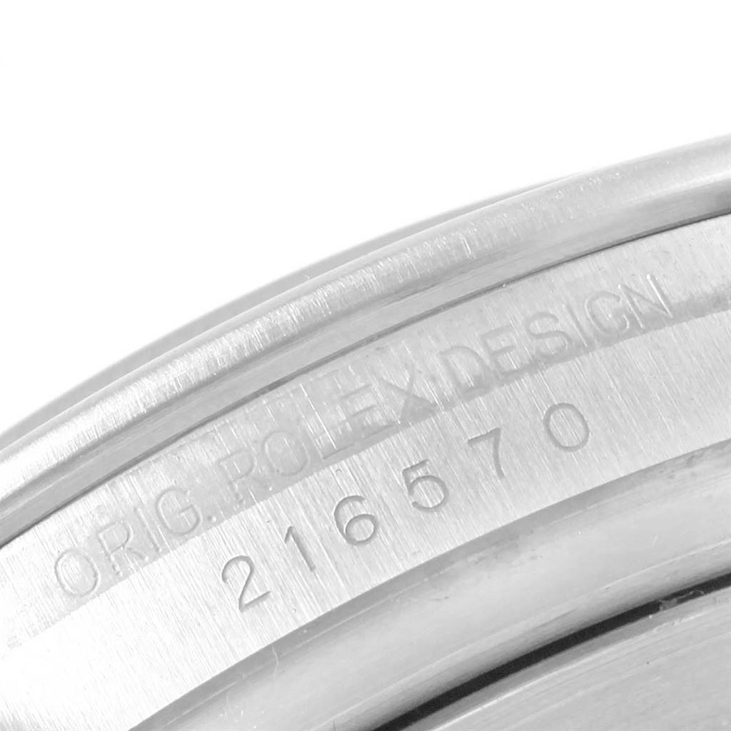 This close-up image shows the model and design markings on the side of a Rolex Explorer 216570 Men's Stainless Steel White Dial 216570 Men's Stainless Steel White Dial watch.