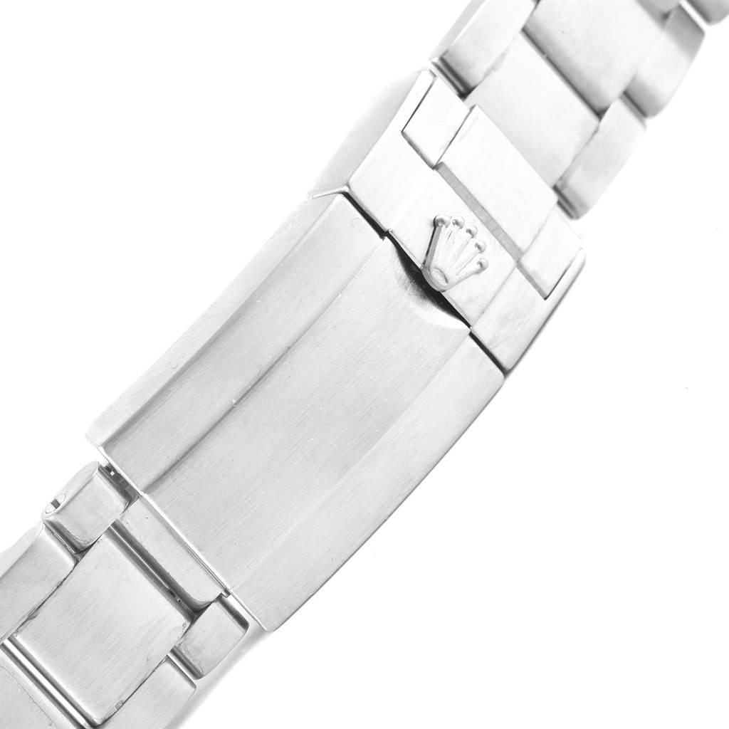 The image shows the clasp and part of the bracelet of a Rolex Explorer 216570 Men's Stainless Steel White Dial 216570 Men's Stainless Steel White Dial watch, viewed from above.