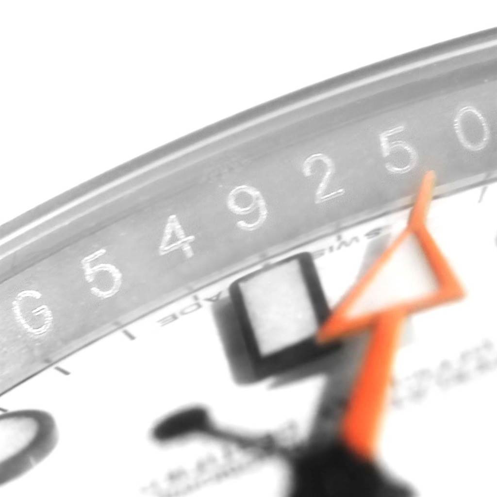 The image shows a close-up of the dial and orange hand of a Rolex Explorer 216570 Men's Stainless Steel White Dial 216570 Men's Stainless Steel White Dial watch.