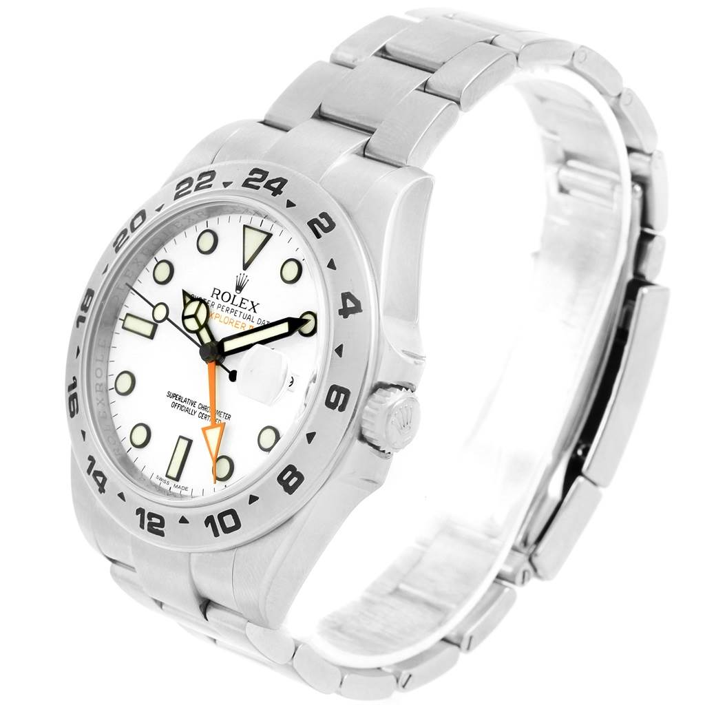 The Rolex Explorer 216570 Men's Stainless Steel White Dial 216570 Men's Stainless Steel White Dial watch is shown from a front side angle, displaying the face, bezel, crown, and bracelet.