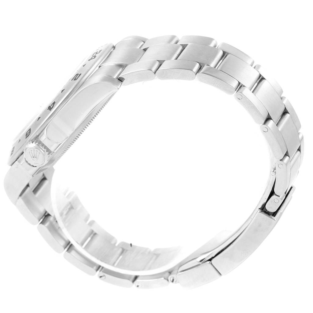 The image shows a side view of a Rolex Explorer 216570 Men's Stainless Steel White Dial 216570 Men's Stainless Steel White Dial watch's case and metal bracelet.