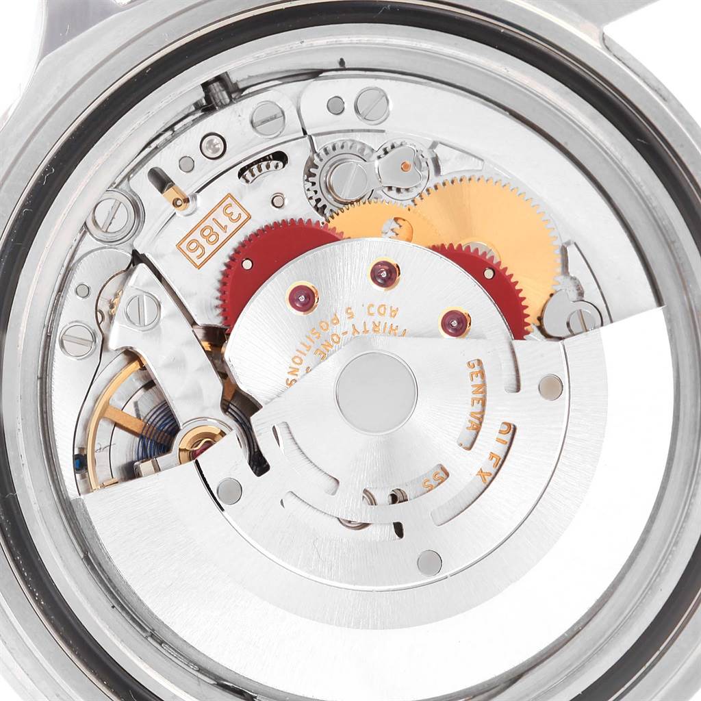 The image shows a close-up of the internal mechanism and movement of the Rolex Explorer 16677 Men's Stainless Steel Black Dial 16677 Men's Stainless Steel Black Dial watch.
