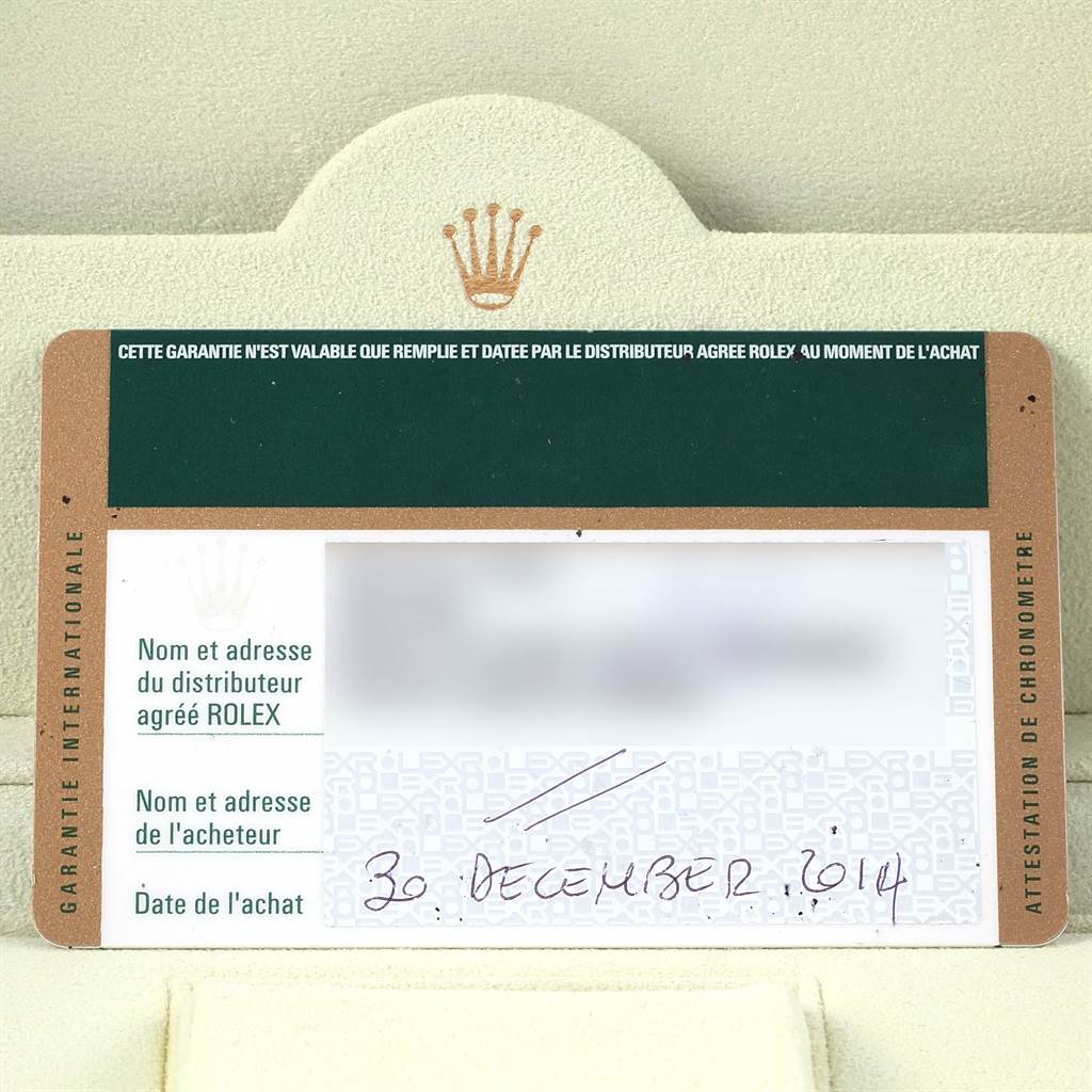 This image shows the warranty card for a Rolex Explorer 16570 Men's Stainless Steel White Dial 16570 Men's Stainless Steel White Dial watch, dated December 30, 2014.