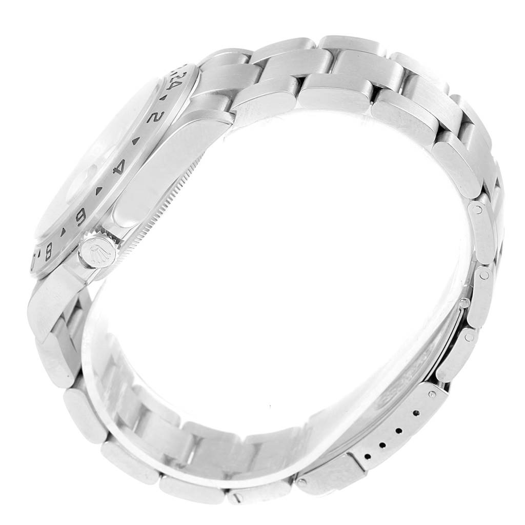 The image shows a side view of the Rolex Explorer 16570 Men's Stainless Steel White Dial 16570 Men's Stainless Steel White Dial watch, highlighting the bracelet, crown, and part of the bezel.