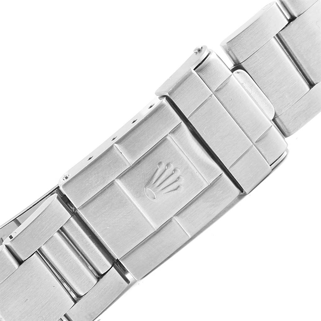 The image shows a close-up of the clasp and bracelet of a Rolex Explorer 16570 Men's Stainless Steel White Dial 16570 Men's Stainless Steel White Dial watch.