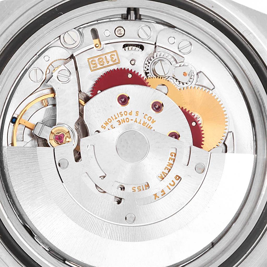 This image shows the internal mechanical movement of a Rolex Explorer 16570 Men's Stainless Steel White Dial 16570 Men's Stainless Steel White Dial watch, specifically the rotor, gears, and balance wheel.