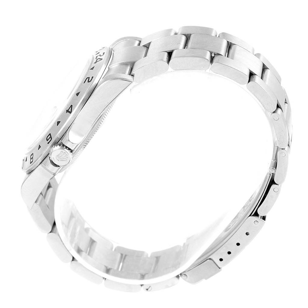 This image shows a side view of the Rolex Explorer 16570 Men's Stainless Steel White Dial 16570 Men's Stainless Steel White Dial watch, highlighting its crown, bezel, and stainless-steel bracelet.