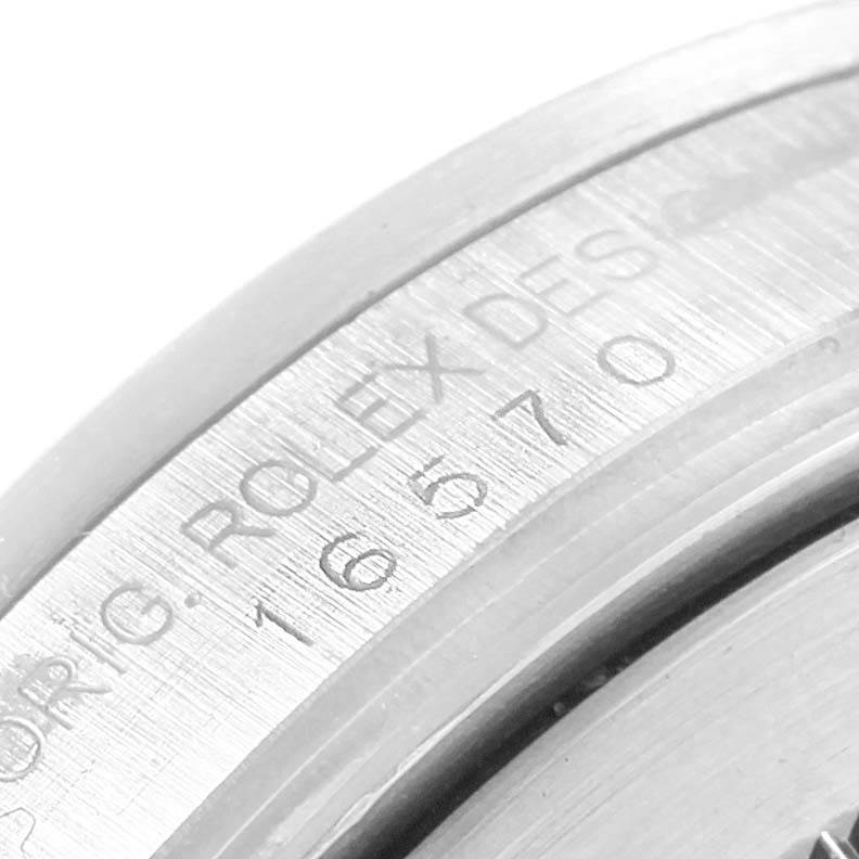 Close-up angle of the casing, showing the engraved model number "16570" and "Rolex Design" inscription on the Rolex Explorer 16570 Men's Stainless Steel White Dial 16570 Men's Stainless Steel White Dial.