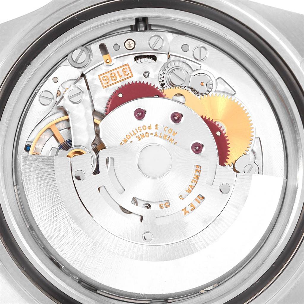 The image shows the movement mechanism of a Rolex Explorer 16570 Men's Stainless Steel Black Dial 16570 Men's Stainless Steel Black Dial watch, highlighting its intricate gear and rotor components.