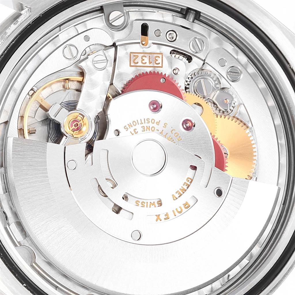 This image shows a close-up view of the intricate internal movement mechanism of a Rolex Explorer 214270 Men's Stainless Steel Black Dial 214270 Men's Stainless Steel Black Dial watch.