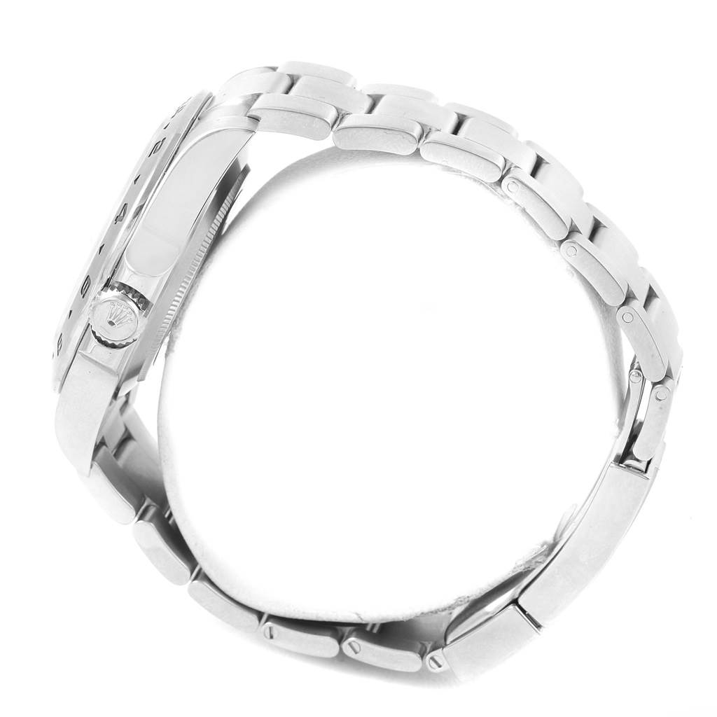 The image shows a side view of the Rolex Explorer 216570 Men's Stainless Steel Black Dial 216570 Men's Stainless Steel Black Dial watch focused on the bracelet and crown.