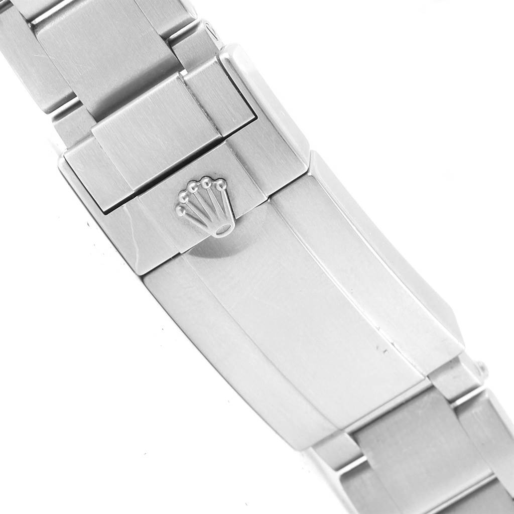 The image shows a close-up of the clasp and part of the bracelet of a Rolex Explorer 216570 Men's Stainless Steel White Dial 216570 Men's Stainless Steel White Dial watch.