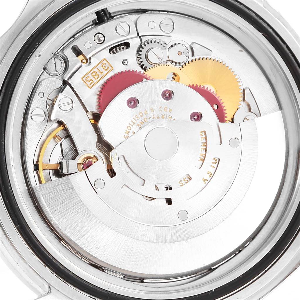 This is a close-up view of the movement mechanism of a Rolex Explorer 16570 Men's Stainless Steel Black Dial 16570 Men's Stainless Steel Black Dial watch.
