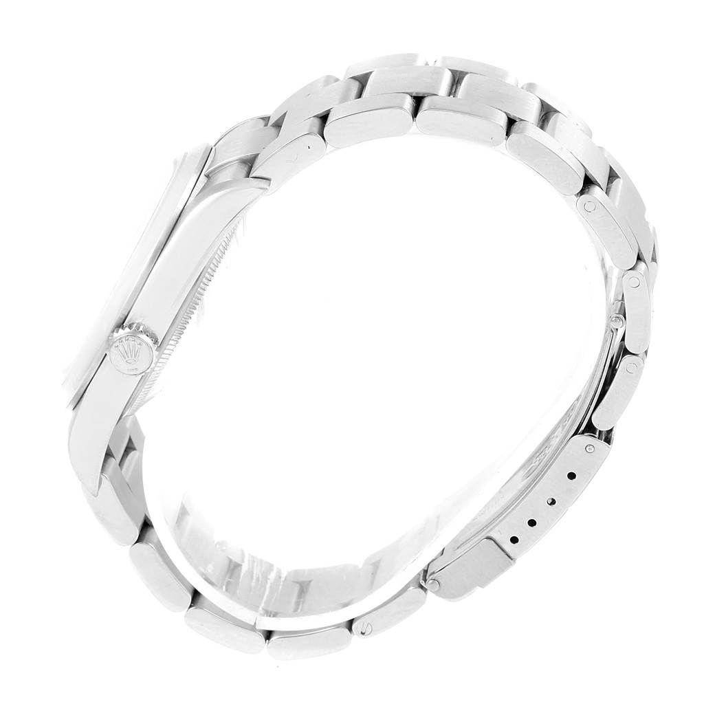 The image shows a side view of a Rolex Explorer 114270 Men's Stainless Steel Black Dial 114270 Men's Stainless Steel Black Dial watch, focusing on the case and bracelet, including the clasp.