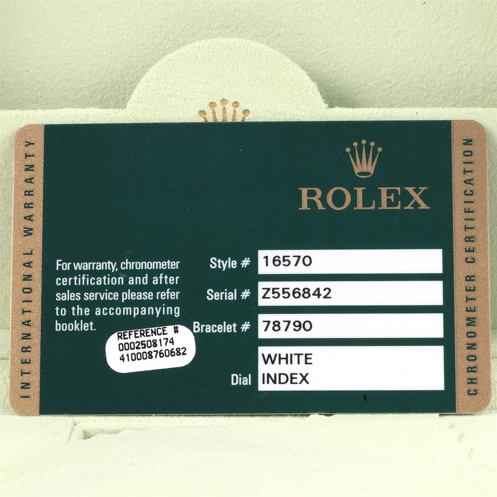 The image shows an international warranty card for the Rolex Explorer 16570 Men's Stainless Steel White Dial 16570 Men's Stainless Steel White Dial model.