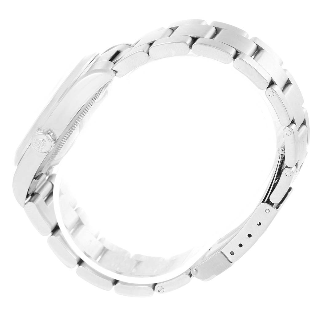 The image shows a side view of the Rolex Explorer 14270 Men's Stainless Steel Black Dial 14270 Men's Stainless Steel Black Dial watch's bracelet and case.