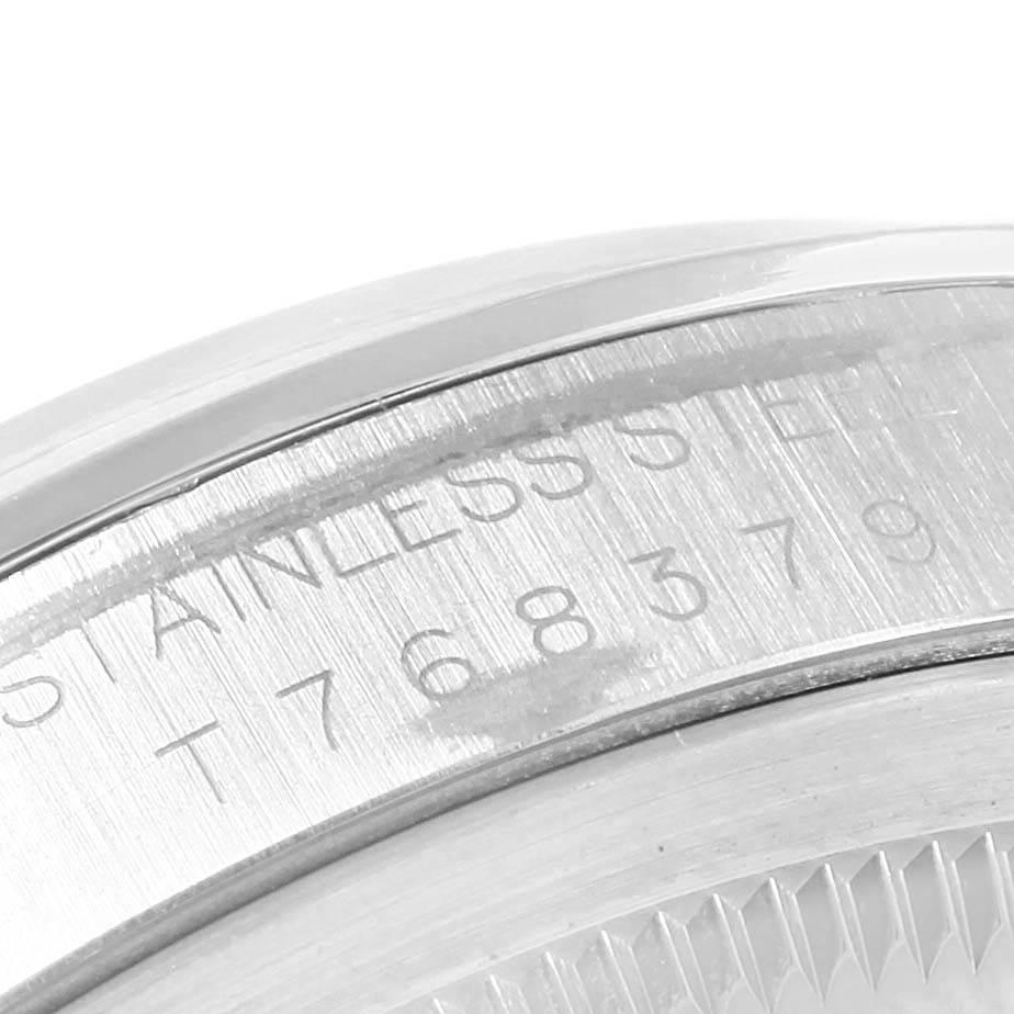 The image shows a close-up of the case back edge with the serial number on the Rolex Explorer 14270 Men's Stainless Steel Black Dial 14270 Men's Stainless Steel Black Dial watch.