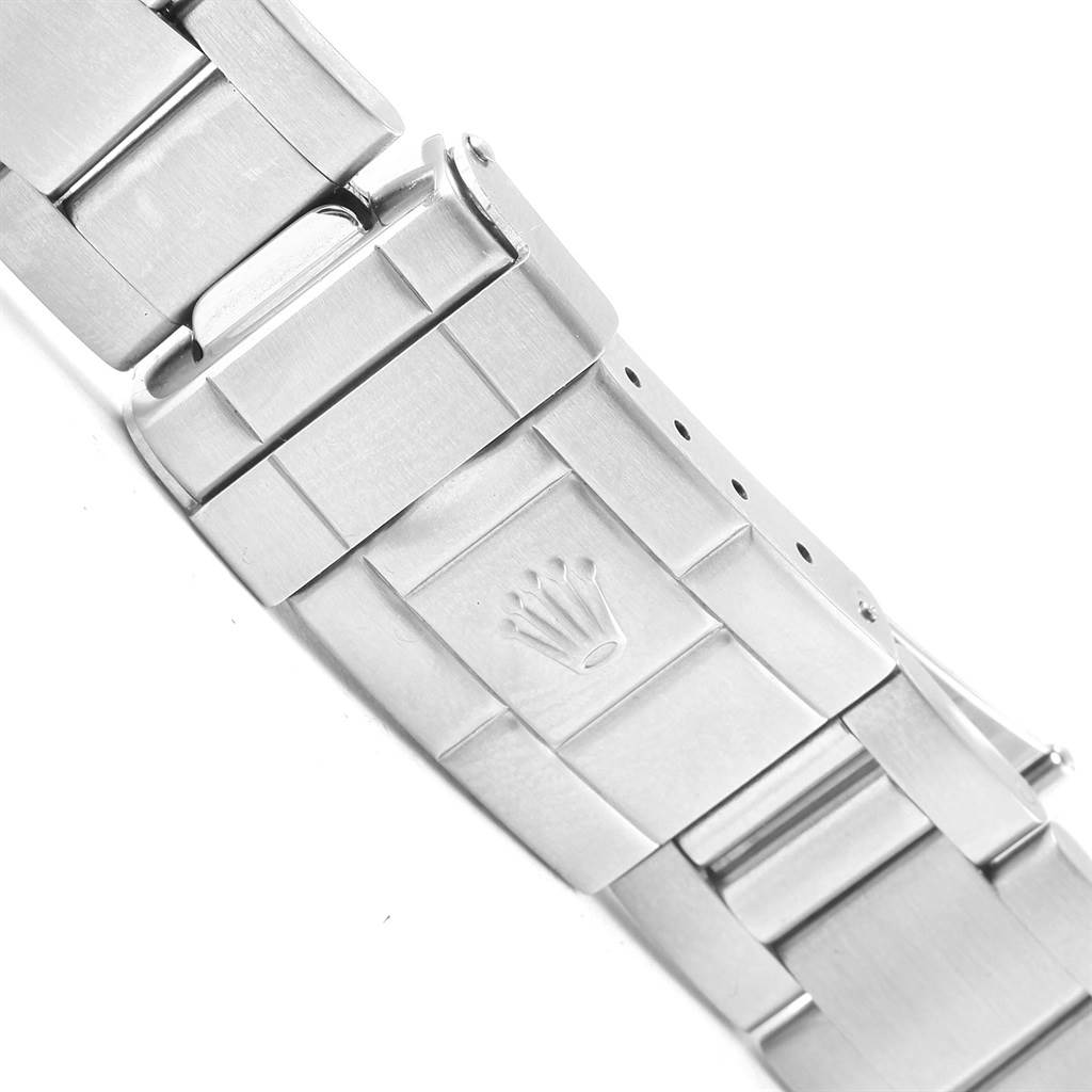 This image shows a close-up of the clasp and bracelet of a Rolex Explorer 16570 Men's Stainless Steel Black Dial 16570 Men's Stainless Steel Black Dial watch.