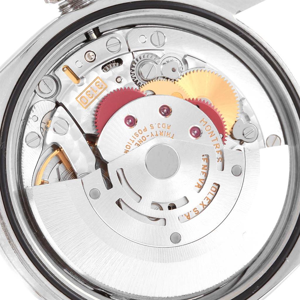 The close-up image shows the internal mechanical movement of the Rolex Explorer 114270 Men's Stainless Steel Black Dial 114270 Men's Stainless Steel Black Dial watch.