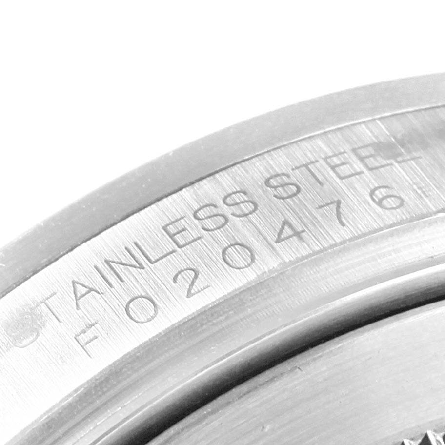 This image shows an angled close-up of the case back with an engraved serial number of the Rolex Explorer 16570 Men's Stainless Steel Black Dial 16570 Men's Stainless Steel Black Dial model in stainless steel.