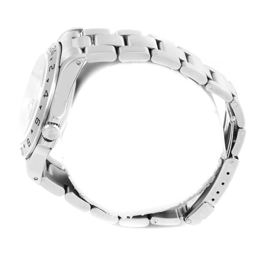 The image shows a side profile of the Rolex Explorer 16570 Men's Stainless Steel Black Dial 16570 Men's Stainless Steel Black Dial watch, including parts of the bracelet, bezel, and crown.