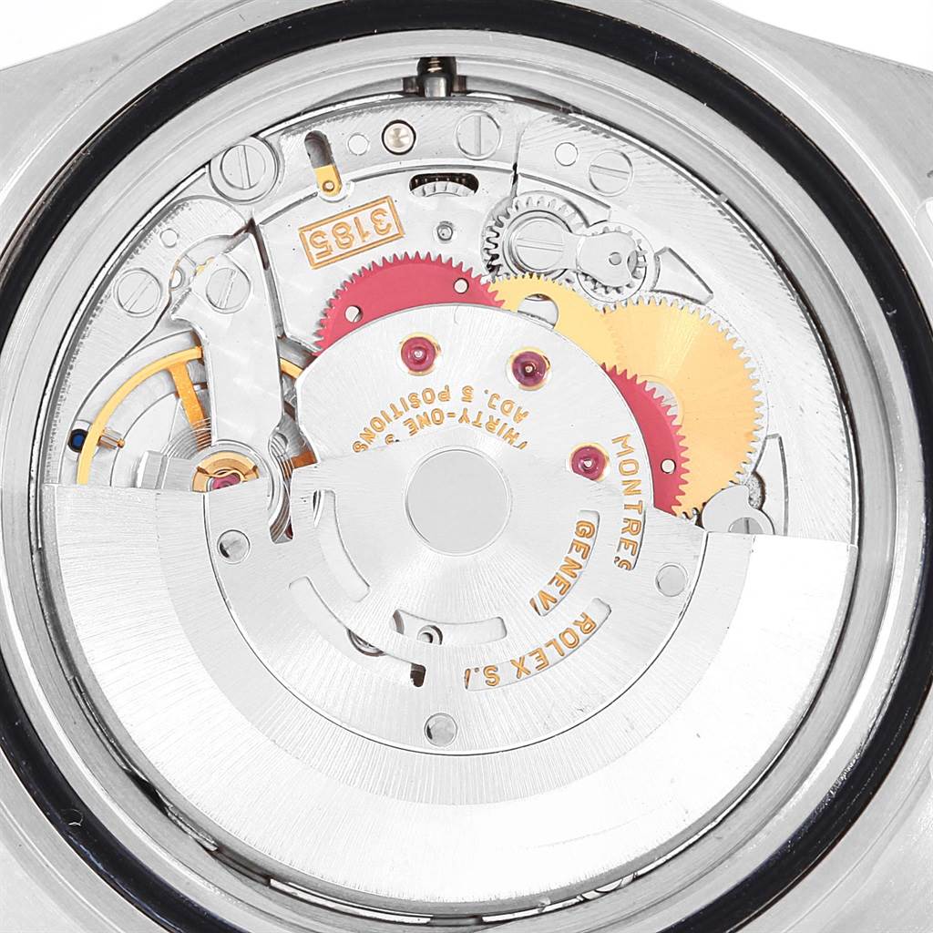 This image shows the internal mechanism of a Rolex Explorer 16570 Men's Stainless Steel Black Dial 16570 Men's Stainless Steel Black Dial watch from a top-down angle, highlighting the gears and movement components.