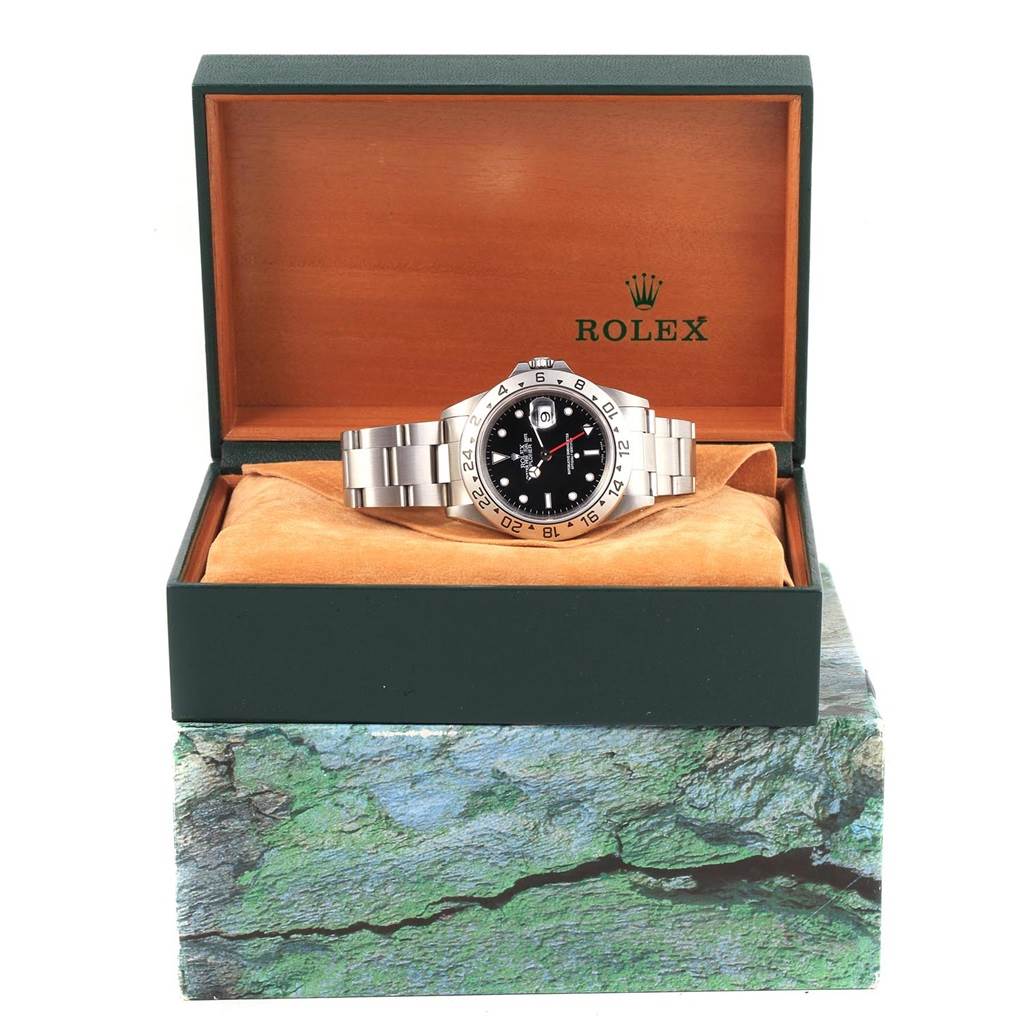 The Rolex Explorer 16570 Men's Stainless Steel Black Dial 16570 Men's Stainless Steel Black Dial watch is shown front-facing inside an open Rolex box.