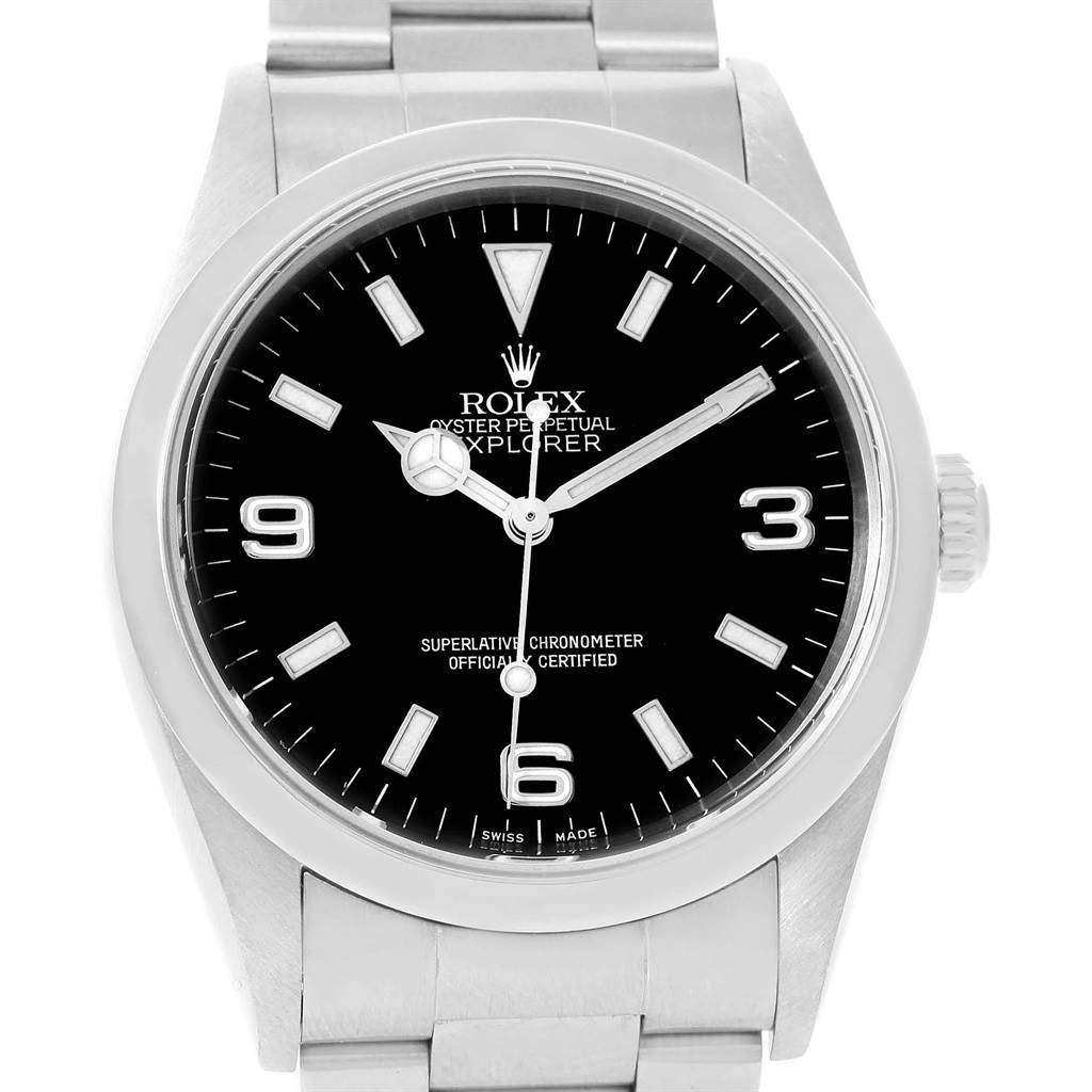 The image shows a front view of the Rolex Explorer 14270 Men's Stainless Steel Black Dial 14270 Men's Stainless Steel Black Dial watch, displaying its black dial, silver hands, and numeric hour markers.