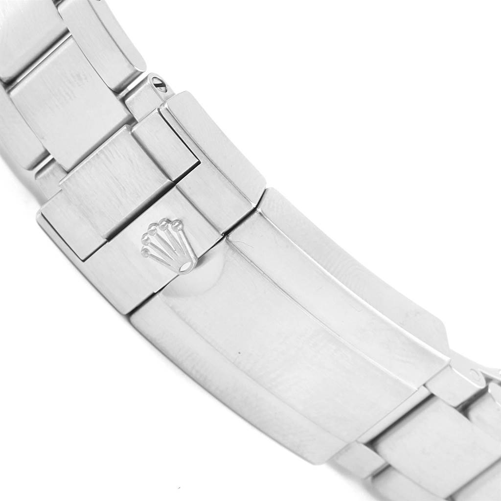 This is a close-up of the clasp and part of the bracelet of a Rolex Explorer 216570 Men's Stainless Steel White Dial 216570 Men's Stainless Steel White Dial watch.