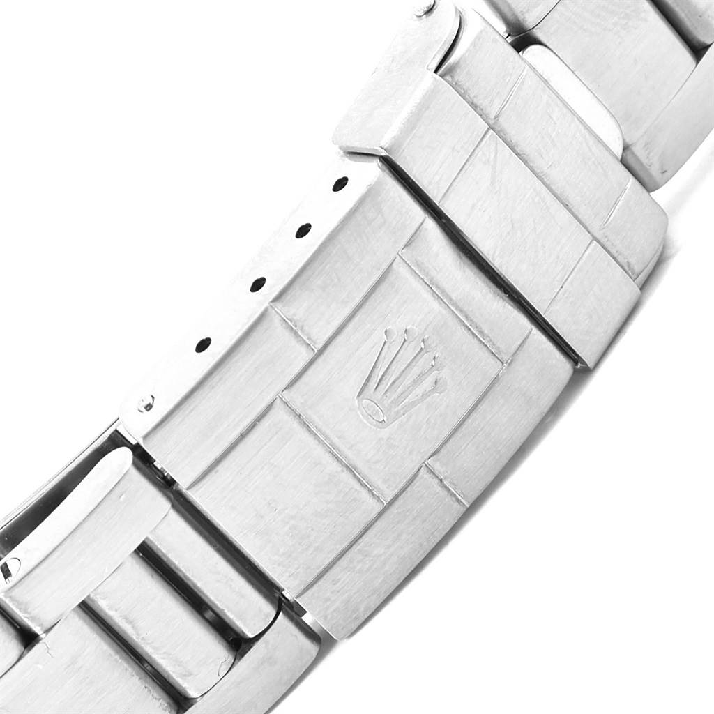 This image shows the clasp and bracelet links of a Rolex Explorer 16570 Men's Stainless Steel Black Dial 16570 Men's Stainless Steel Black Dial model watch, viewed from an angle.