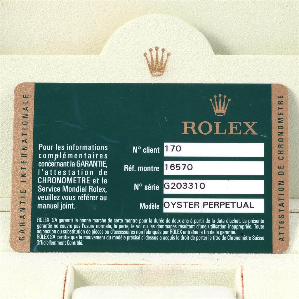 The image shows the guarantee card for a Rolex Oyster Perpetual Explorer model, including customer number, watch reference, and serial number.