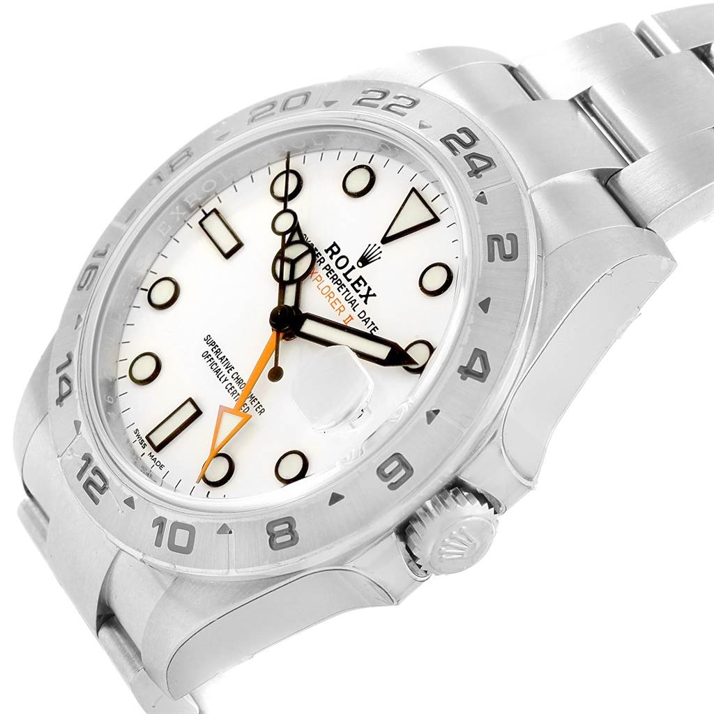 This image shows a close-up view of the dial, bezel, and part of the bracelet of the Rolex Explorer 216570 Men's Stainless Steel White Dial 216570 Men's Stainless Steel White Dial watch.