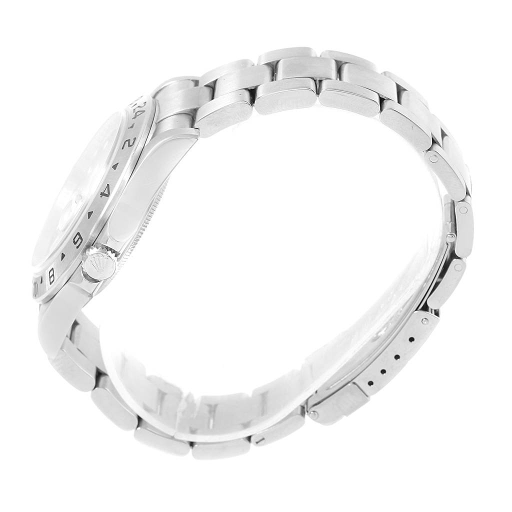 The image shows a side view of a Rolex Explorer 16570 Men's Stainless Steel Black Dial 16570 Men's Stainless Steel Black Dial watch, highlighting its bezel, crown, and bracelet.