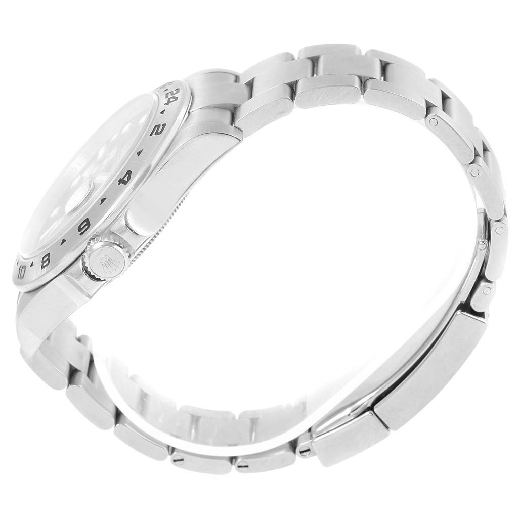 The image shows a side view of a Rolex Explorer 216570 Men's Stainless Steel Black Dial 216570 Men's Stainless Steel Black Dial watch, highlighting its stainless steel band and crown.