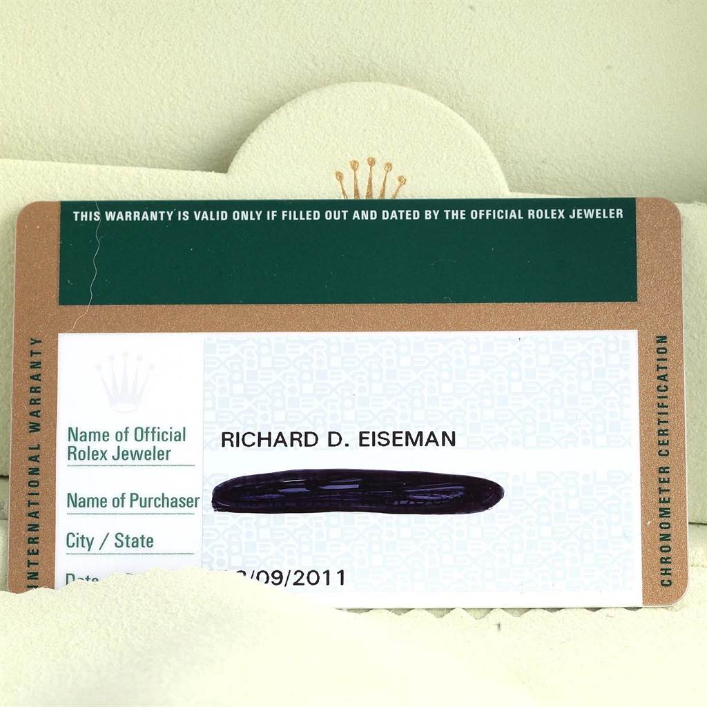 The image shows the warranty card for a Rolex Explorer 16570 Men's Stainless Steel Black Dial 16570 Men's Stainless Steel Black Dial, viewed from the front, displaying some owner details.