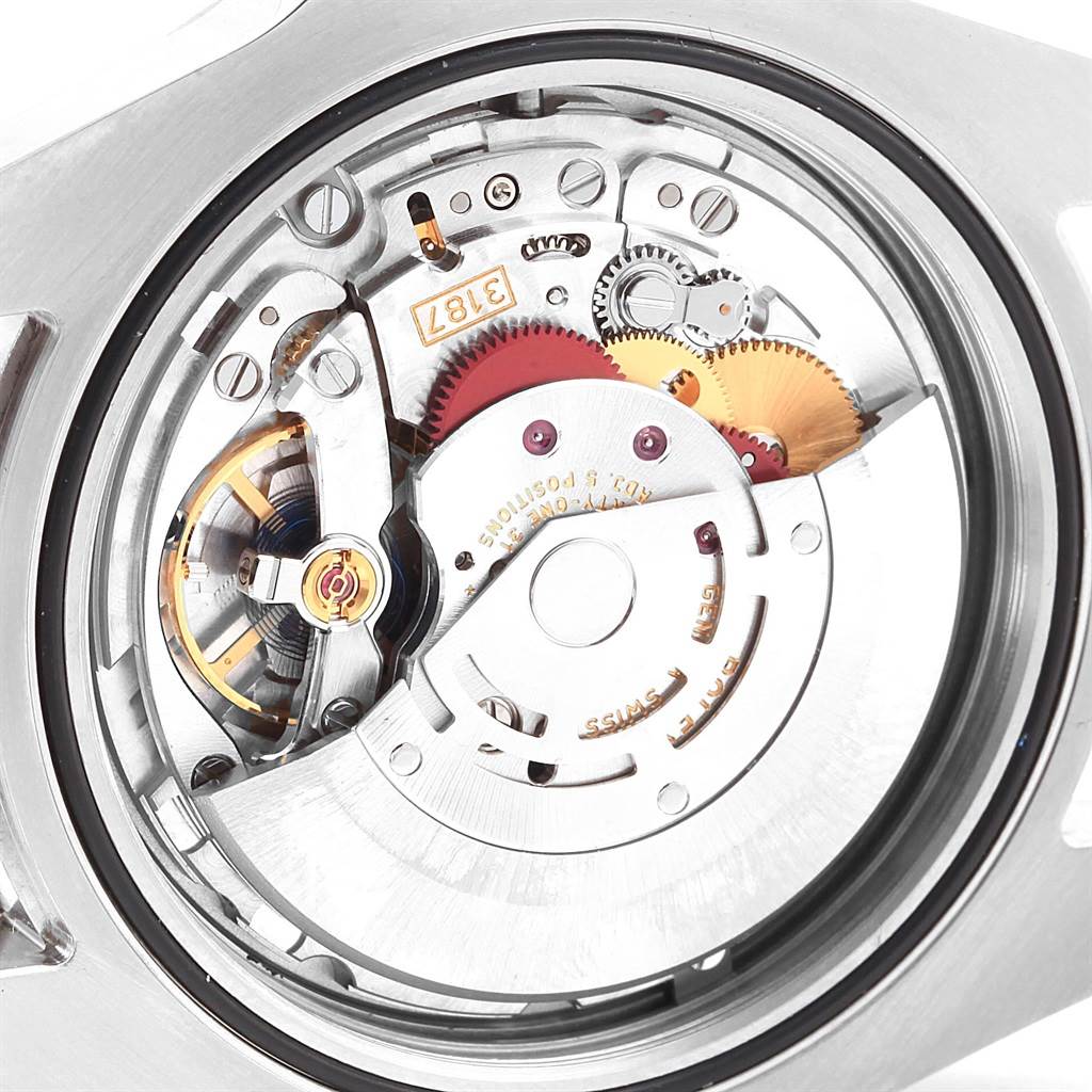 This image shows the internal mechanism of a Rolex Explorer 216570 Men's Stainless Steel White Dial 216570 Men's Stainless Steel White Dial watch, focusing on the movement and gears.