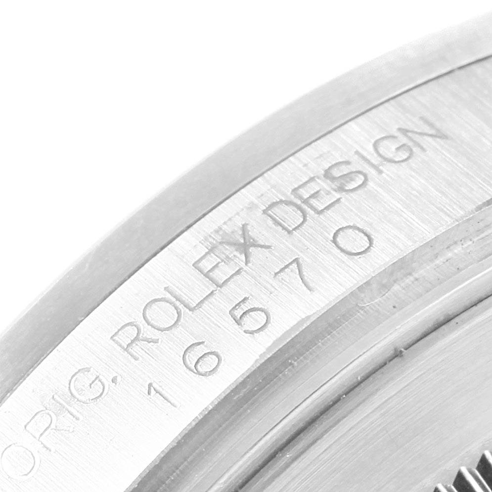 This close-up image shows the engraved model number and brand "Rolex Design" on the case of a Rolex Explorer 16570 Men's Stainless Steel Black Dial 16570 Men's Stainless Steel Black Dial watch.