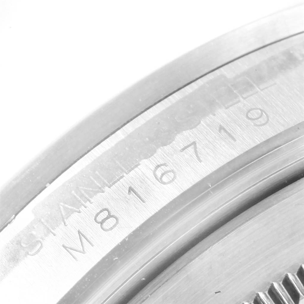 This image shows a close-up of the case back edge with engraved serial numbers of the Rolex Explorer 16570 Men's Stainless Steel White Dial 16570 Men's Stainless Steel White Dial.