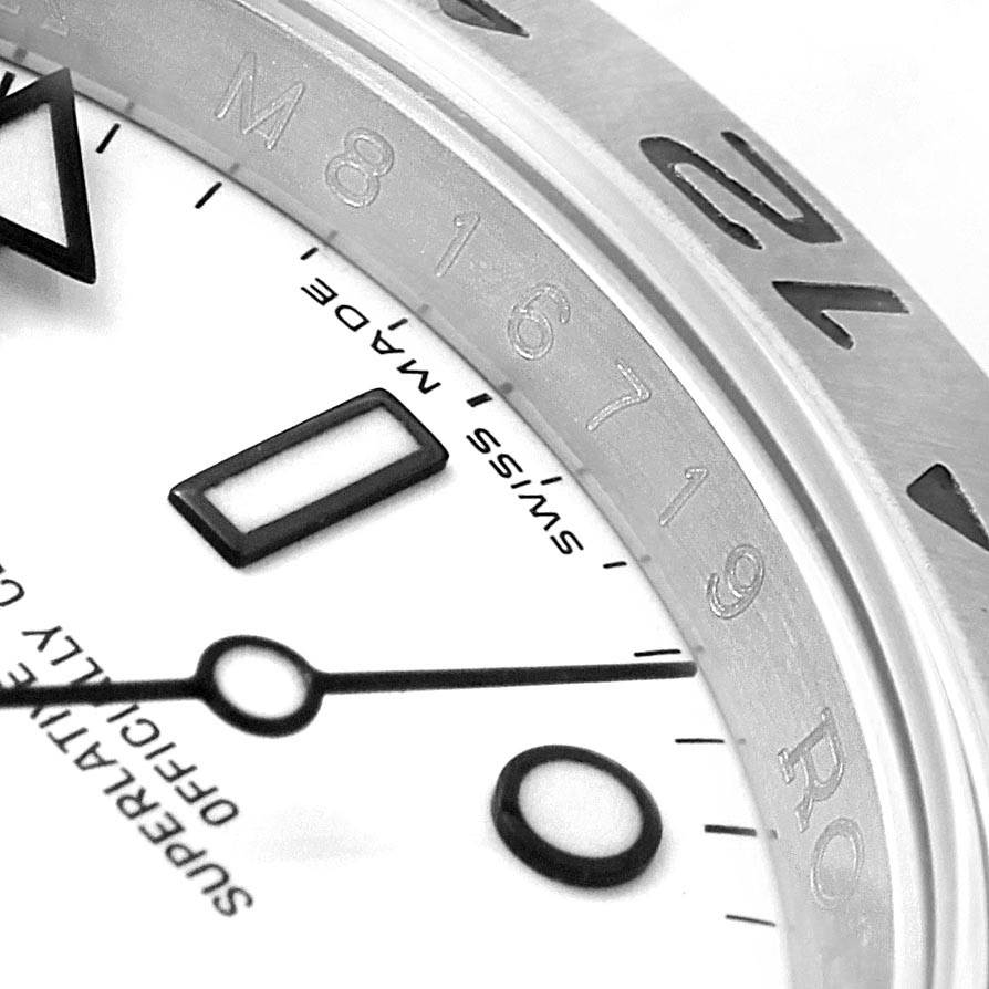 The image shows a close-up of the dial and part of the bezel of the Rolex Explorer 16570 Men's Stainless Steel White Dial 16570 Men's Stainless Steel White Dial watch.