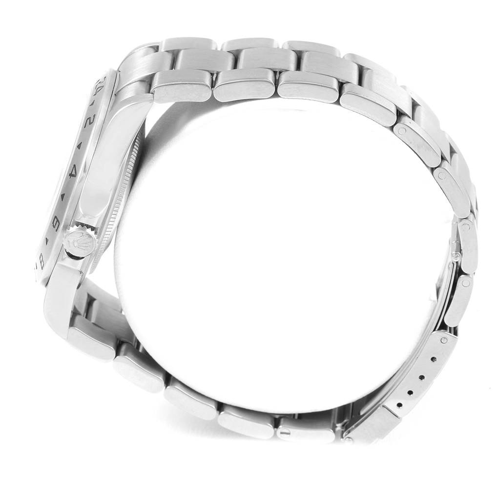 This image shows a side view of a Rolex Explorer 16570 Men's Stainless Steel White Dial 16570 Men's Stainless Steel White Dial, highlighting the case, crown, and bracelet.