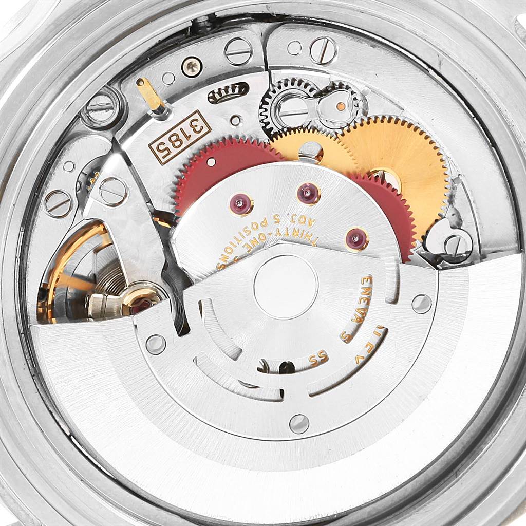 This image shows the internal mechanical movement of a Rolex Explorer 16570 Men's Stainless Steel Black Dial 16570 Men's Stainless Steel Black Dial watch, highlighting its gears and components.