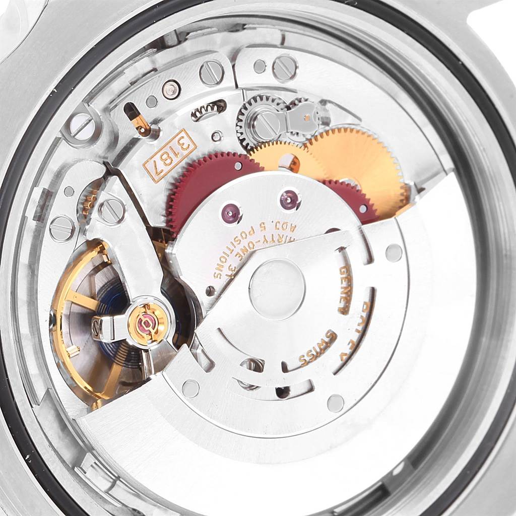 The image shows a close-up view of the movement mechanism inside a Rolex Explorer 216570 Men's Stainless Steel White Dial 216570 Men's Stainless Steel White Dial watch.